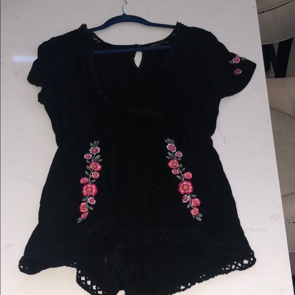 Kendall and Kylie packing black romper